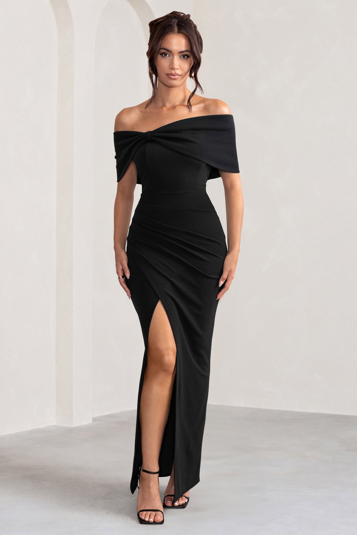 Eva | Robe longue noire bardot avec nœud et fente aux cuisses