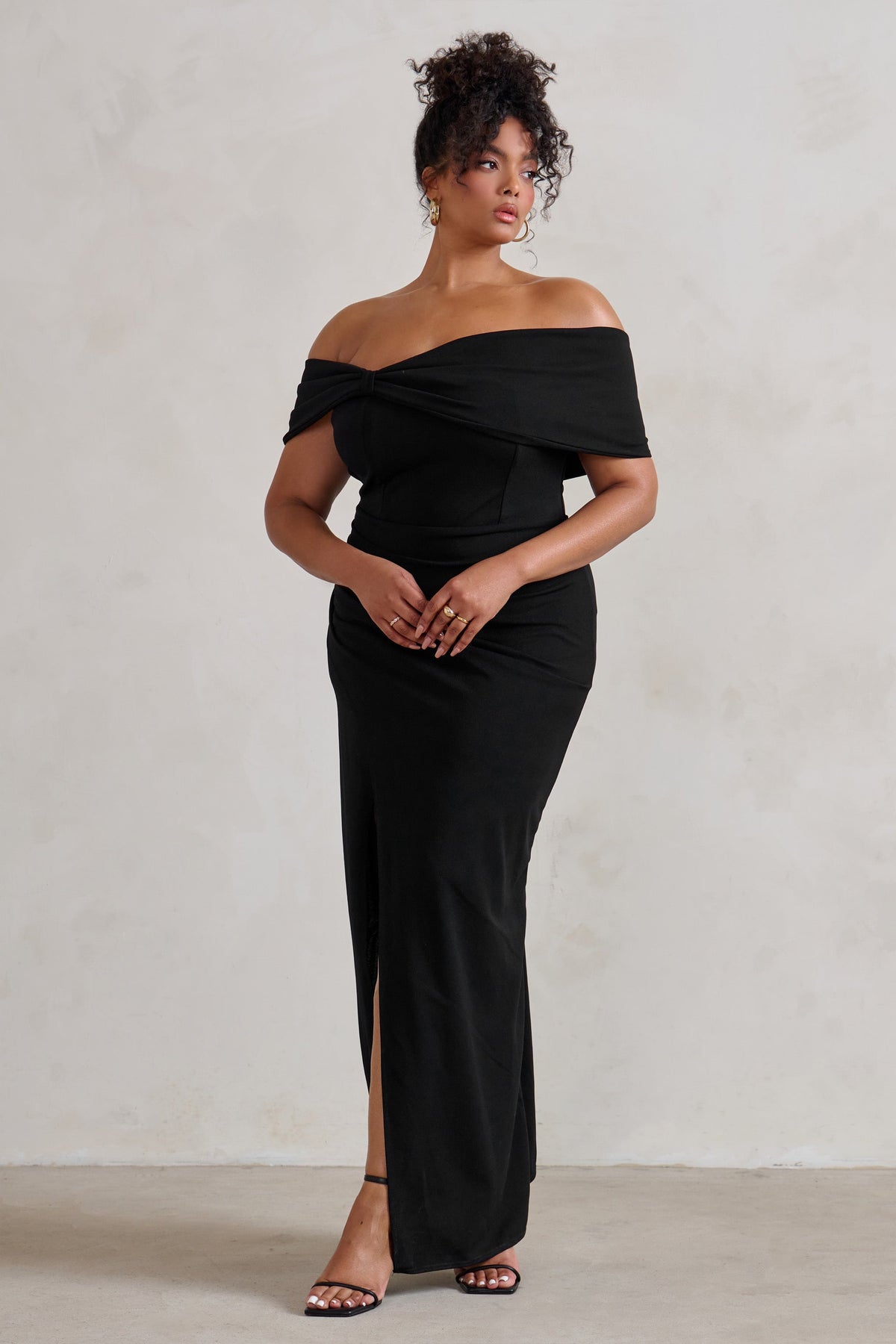 Eva | Robe longue noire bardot avec nœud et fente aux cuisses