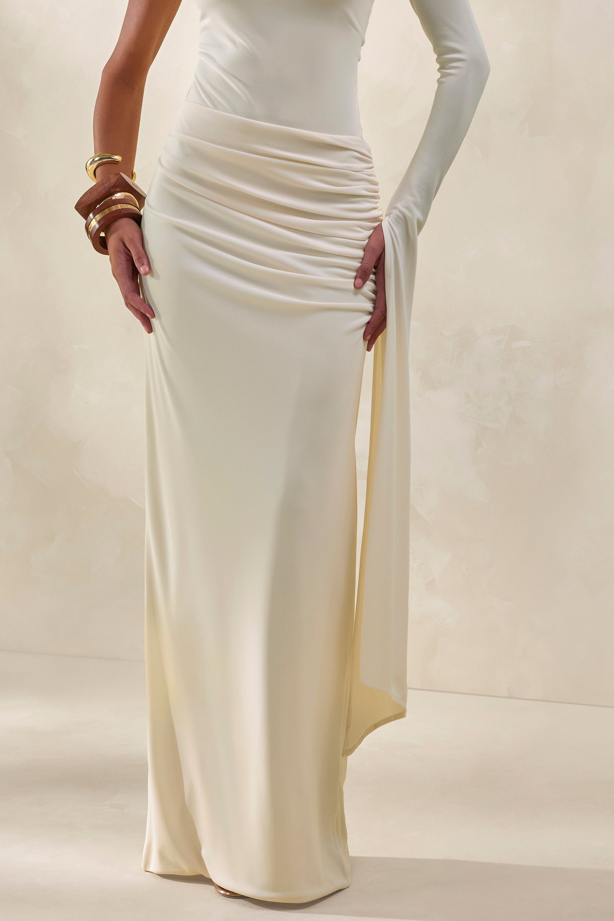 CL13795011106_ECM_HR_CL137950111_-_Adessa_Cream_Asymmetric_Waist_Ruched_Maxi_Skirt_CL137946111_-_Ellora_Cream_High-Neck_One_Sleeve_Bodysuit0