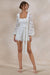 ECM_HR_CL138204110---Korinna-_-White-Lace-Square-Neck-Playsuit-With-Belt-Detail0.jpg