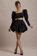 Tosca | Mini-jupe bouffante en satin noir
